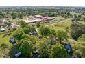 Aerial shot of the neighborhood with a school nearby, showcasing community at 206 Mansfield Dr, Broadway, NC 27505