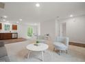 Inviting living space featuring an open floor plan to a kitchen, and a cozy seating area at 25 Beechnut Ct, Franklinton, NC 27525