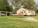 Cute single Gathering home with covered parking and small front porch at 335 Ashley Ave, Timberlake, NC 27583
