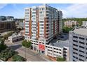 Attractive exterior of condo building with balconies and architectural details at 400 W North St # 1420, Raleigh, NC 27603