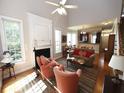 Inviting living room with vaulted ceiling, fireplace, and seamless flow to the kitchen at 5515 S Roxboro St # 16, Durham, NC 27713
