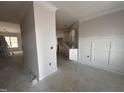 Entryway featuring decorative trim and molding with natural light, seamlessly connecting living spaces at 69 Tee Dr, Selma, NC 27576
