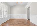 Bright and airy bedroom with hardwood floors, crown molding, and ample natural light at 1012 Trail Stream Way, Knightdale, NC 27545