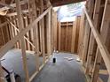 A close-up look at the wooden frame inside of a house during construction at 125 Tee Dr, Selma, NC 27576