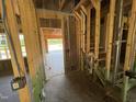 Framed staircase and hallway are being constructed, showcasing the home's developing layout and potential at 125 Tee Dr, Selma, NC 27576
