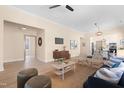 Spacious living area with contemporary decor, including a ceiling fan, area rug, and hardwood floors at 314 Bledsoe Ave, Raleigh, NC 27601