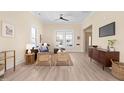 Well-lit living room showcasing modern furnishings, light-colored walls, and large windows for ample natural light at 314 Bledsoe Ave, Raleigh, NC 27601
