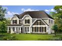 An inviting home exterior with black shutters, light beige and brown siding, and lush green lawn at 315 Adams Pointe Ct, Angier, NC 27501