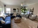 Inviting living room with plush seating, lots of windows and decorative accents at 510 Braden Dr, Durham, NC 27713
