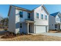 Beautiful two-story home with a two-car garage and well-manicured landscaping at 79 Fern Ridge Dr, Cameron, NC 28326