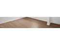 Close up image of new construction, light, wood-look flooring throughout the home at 4867 Pioneer Dr, Sanford, NC 27330