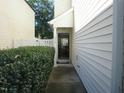 Inviting front entrance with a well-maintained walkway and freshly landscaped bushes at 1613 Beacon Valley Dr, Raleigh, NC 27604