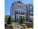 Attractive multi-story townhouse with manicured landscaping and a welcoming front entrance at 1643 Wimberly Rd, Apex, NC 27523
