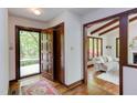 Inviting entryway showcasing hardwood floors and an open view to the living room at 635 Kensington Dr, Chapel Hill, NC 27514