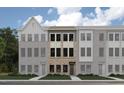 New townhouse complex with brick, gray and white facade, visible windows and front lawn at 670 Bandon Aly, Cary, NC 27513