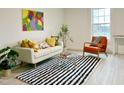 Bright and airy living room with neutral tones and stylish furnishings at 808 E Hanover Rd, Graham, NC 27253