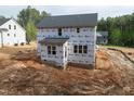 Rear view of a two-story home under construction, showcasing the layout and potential for outdoor living at 85 Purslane Dr, Franklinton, NC 27525