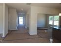 Open-concept living space with gray walls and bright natural light at 89 Grove Township Way, Angier, NC 27501