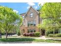 Charming brick townhome with stone accents and manicured landscaping at 1601 Bowery Dr, Raleigh, NC 27607