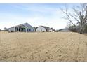 Large backyard showing ample space between homes in the community at 21 Artesa Ct, Fuquay Varina, NC 27526