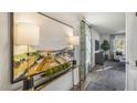 Inviting entryway features an on trend console table and views into the living room at 2156 Monk Dr, Haw River, NC 27258