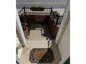 Charming front steps with brick wall and flower boxes, leading to a welcoming entrance mat at 4502 Pale Moss Dr, Raleigh, NC 27606