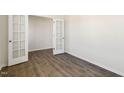 Office space featuring double french doors, hardwood flooring and bright natural light at 816 Canis Minor Rd, Wendell, NC 27591