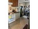 Bright kitchen featuring white appliances and ample counter space at 3414 Renee Dr, Sanford, NC 27332