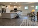 Bright, open kitchen featuring an island, modern appliances, and ample counter space at 4118 Rillcrest Grove Way, Fuquay Varina, NC 27526