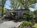 Charming single-story home with landscaped front yard and inviting porch at 5138 Nc 56, Franklinton, NC 27525