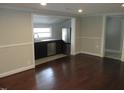 Features stainless steel appliances, dark cabinetry, and easy access to the living area at 176 Fletcher Ave, Fuquay Varina, NC 27526