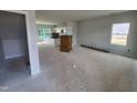 Spacious living room featuring an open floor plan and natural light at 54 Grove Township Way, Angier, NC 27501