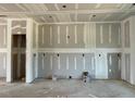Spacious room with unfinished walls and flooring, ready for customization and design at 59 Grove Township Way, Angier, NC 27501