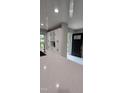 Bright kitchen with quartz countertop, stainless steel faucet, and modern cabinetry at 6409 Lakeland Dr, Raleigh, NC 27612