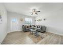 Bright and airy living room offers modern furnishings, light flooring and plenty of natural light at 85 Sun Mdw Cir, Benson, NC 27504