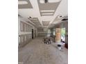 Spacious living room featuring modern ceiling design and awaiting final touches at 2654 Lawndale, Durham, NC 27705