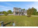 Attractive home with a big front yard, covered entry and two-car attached garage at 28 Lee Woods Dr, Clayton, NC 27520