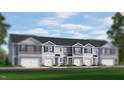 Exterior view of townhomes showcasing a neutral palette and coordinated architectural details with garage and entry doors at 104 Red Maple St, Sanford, NC 27332