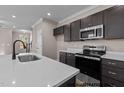 Well-equipped kitchen with stainless steel oven, microwave, and ample counter space at 133 Pearl St # 7, Garner, NC 27529