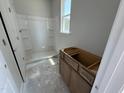 New bathroom with a shower and vanity installation, ready for customization and design at 311 Chesapeake Commons St # 101, Garner, NC 27529