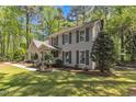 Charming two-story home with classic shutters and a spacious yard at 108 Maplewood Dr, Knightdale, NC 27545