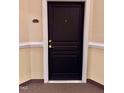 Stylish black apartment door with gold hardware and unit number, enhancing entryway appeal at 1521 Providence Glen Dr # 1521, Chapel Hill, NC 27514