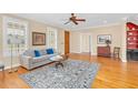 Spacious living room with hardwood floors, neutral paint, and a ceiling fan at 88 Eltham, Rocky Mount, NC 27804