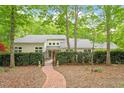 Beautiful home with privacy fence and lush surroundings at 919 Woodham, Pittsboro, NC 27312