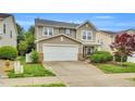 Charming two-story home with a two-car garage and well-maintained landscaping at 105 Ryder Cup Cir, Raleigh, NC 27603