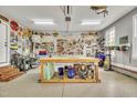 Well-organized garage with storage and work space at 124 Mantle Dr, Clayton, NC 27527