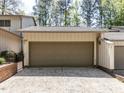Two-car garage of home with a driveway and a well-maintained exterior at 222 Kelso Ct, Cary, NC 27511