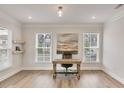 Bright office space with hardwood floors, lots of light and a neutral color palette at 33 Highpointe Dr, Pittsboro, NC 27312