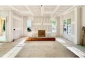 Expansive living room showing great natural light from the outdoor living space and windows ready to be finished at 3817 Coach Lantern Ave, Wake Forest, NC 27587