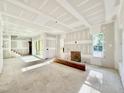 Spacious living room featuring plentiful natural light, and open-concept design ready to be finished at 3817 Coach Lantern Ave, Wake Forest, NC 27587